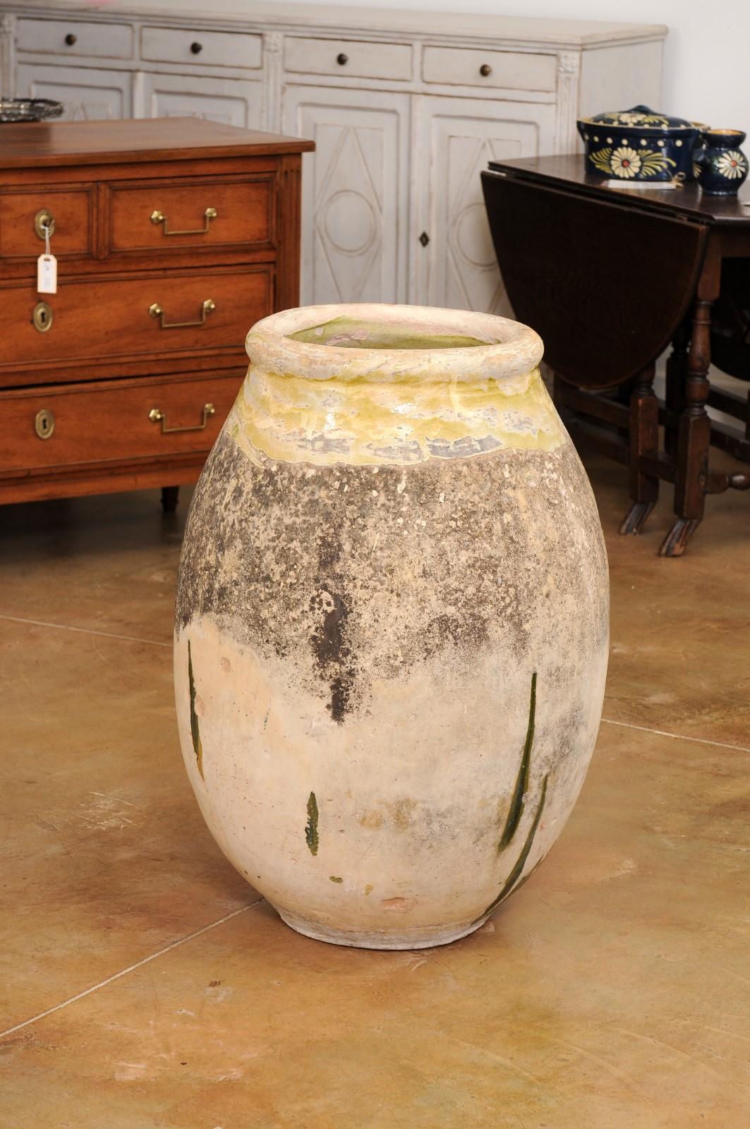 French Provincial French 19th Century Terracotta Biot Jar with Yellow Glaze and Rustic Character For Sale