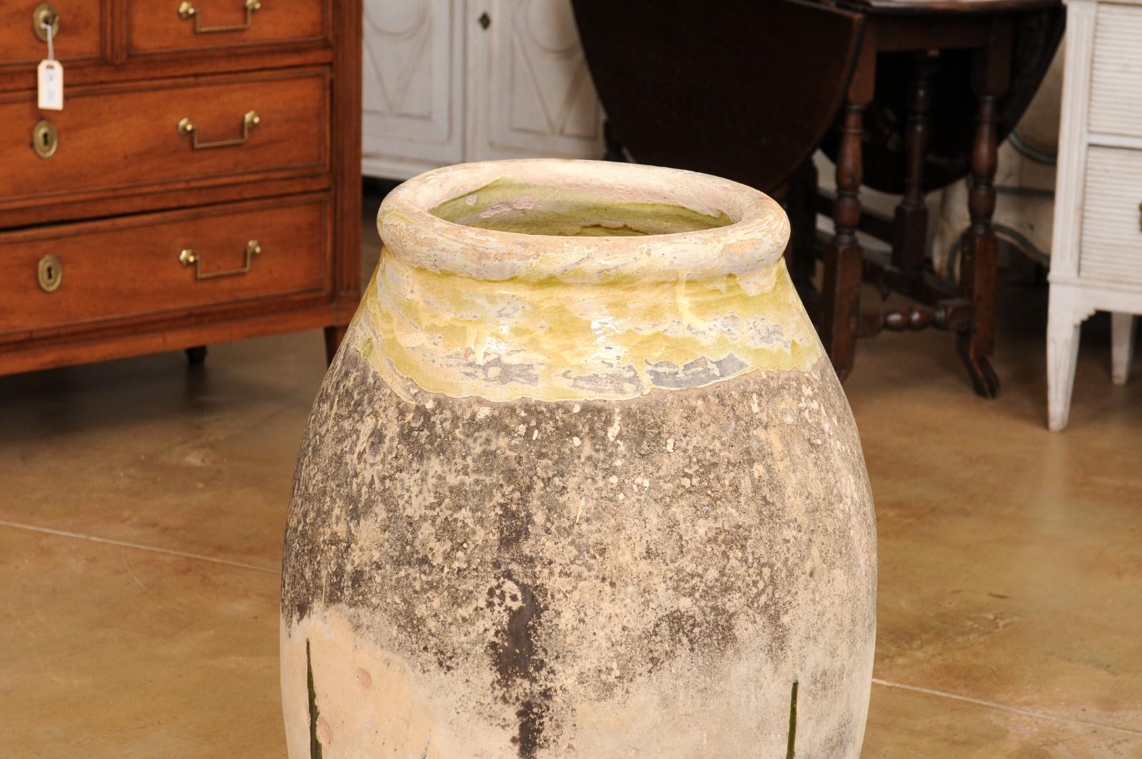 Glazed French 19th Century Terracotta Biot Jar with Yellow Glaze and Rustic Character For Sale