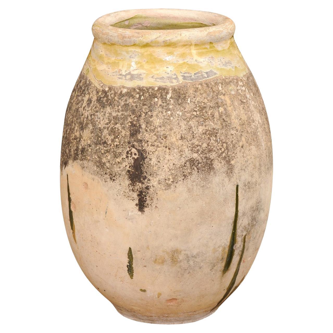 French 19th Century Terracotta Biot Jar with Yellow Glaze and Rustic Character