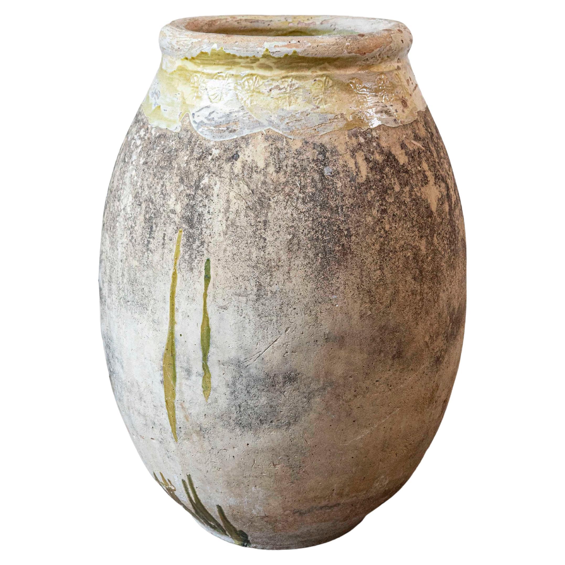 French 19th Century Terracotta Biot Jar with Yellow Glaze and Rustic Character