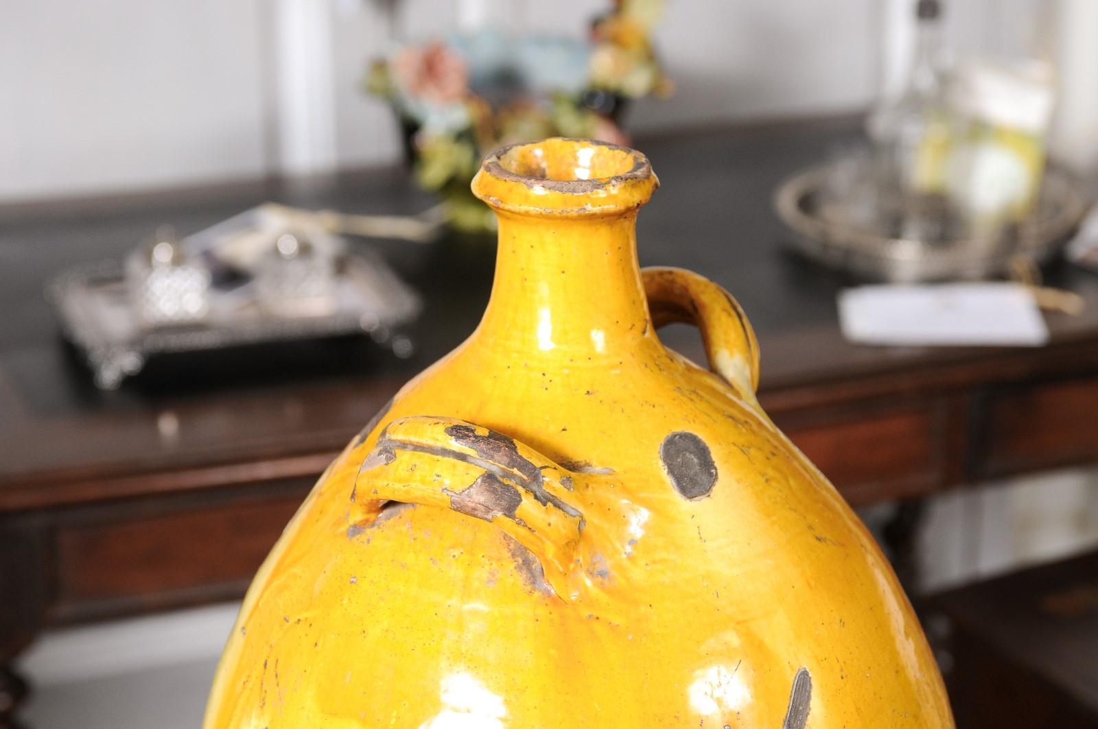 Glazed French 19th Century Terracotta Conscience Olive Oil Jar with Yellow Glaze