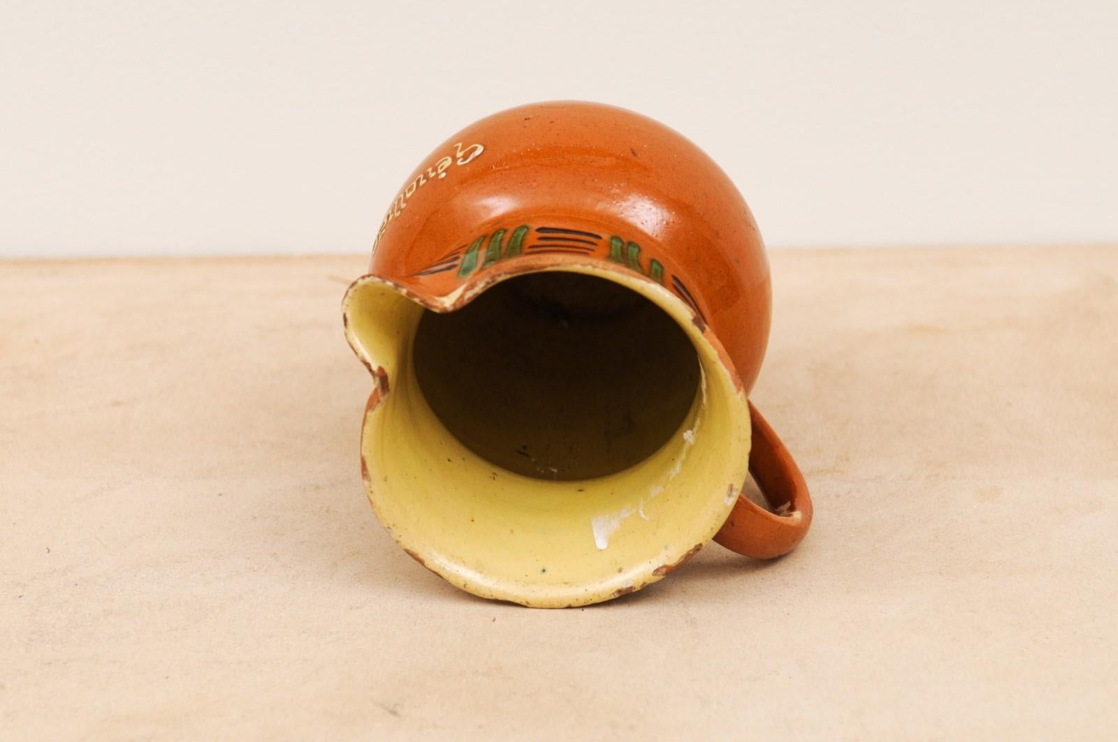 French 19th Century Terracotta Pitcher from Génolhac with Russet Colored Glaze For Sale 6