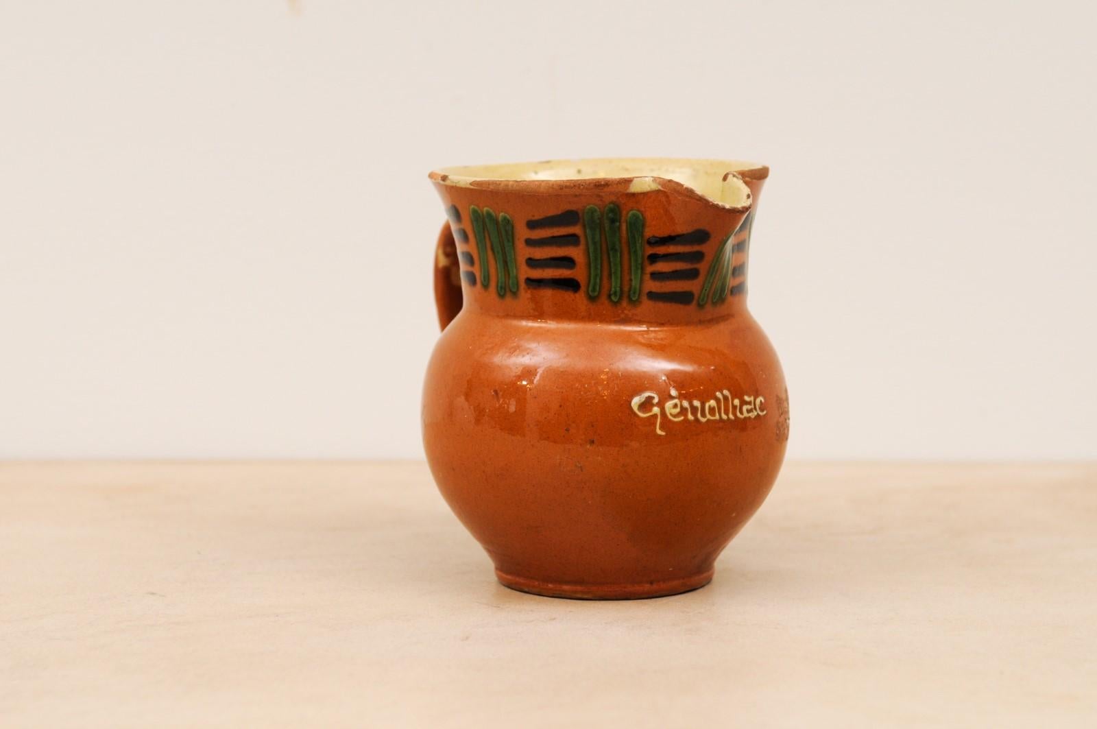 French 19th Century Terracotta Pitcher from Génolhac with Russet Colored Glaze In Good Condition For Sale In Atlanta, GA
