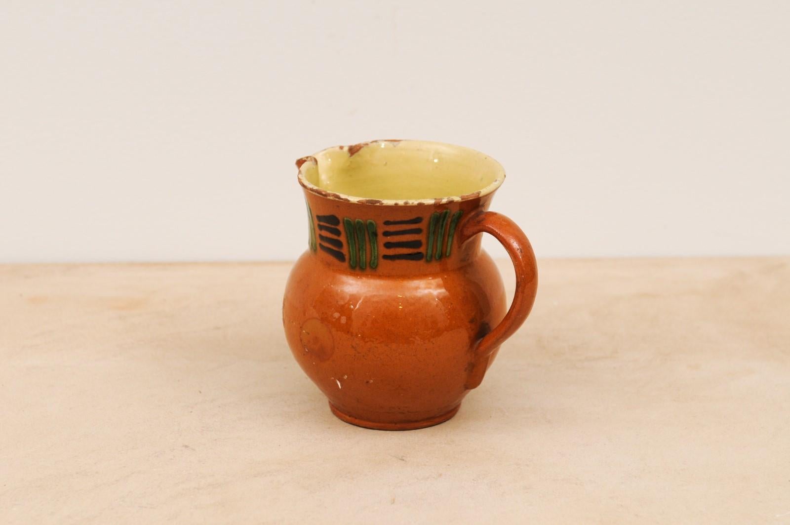 French 19th Century Terracotta Pitcher from Génolhac with Russet Colored Glaze For Sale 2
