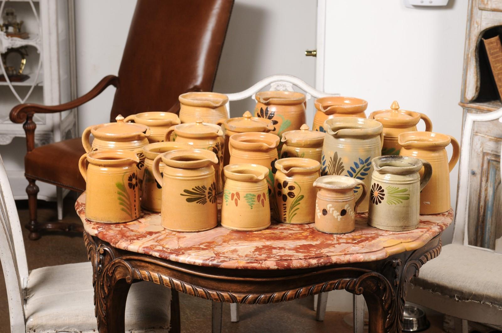 Rustic French 19th Century Terracotta Pottery Pitchers with Floral Decor, Sold Each For Sale