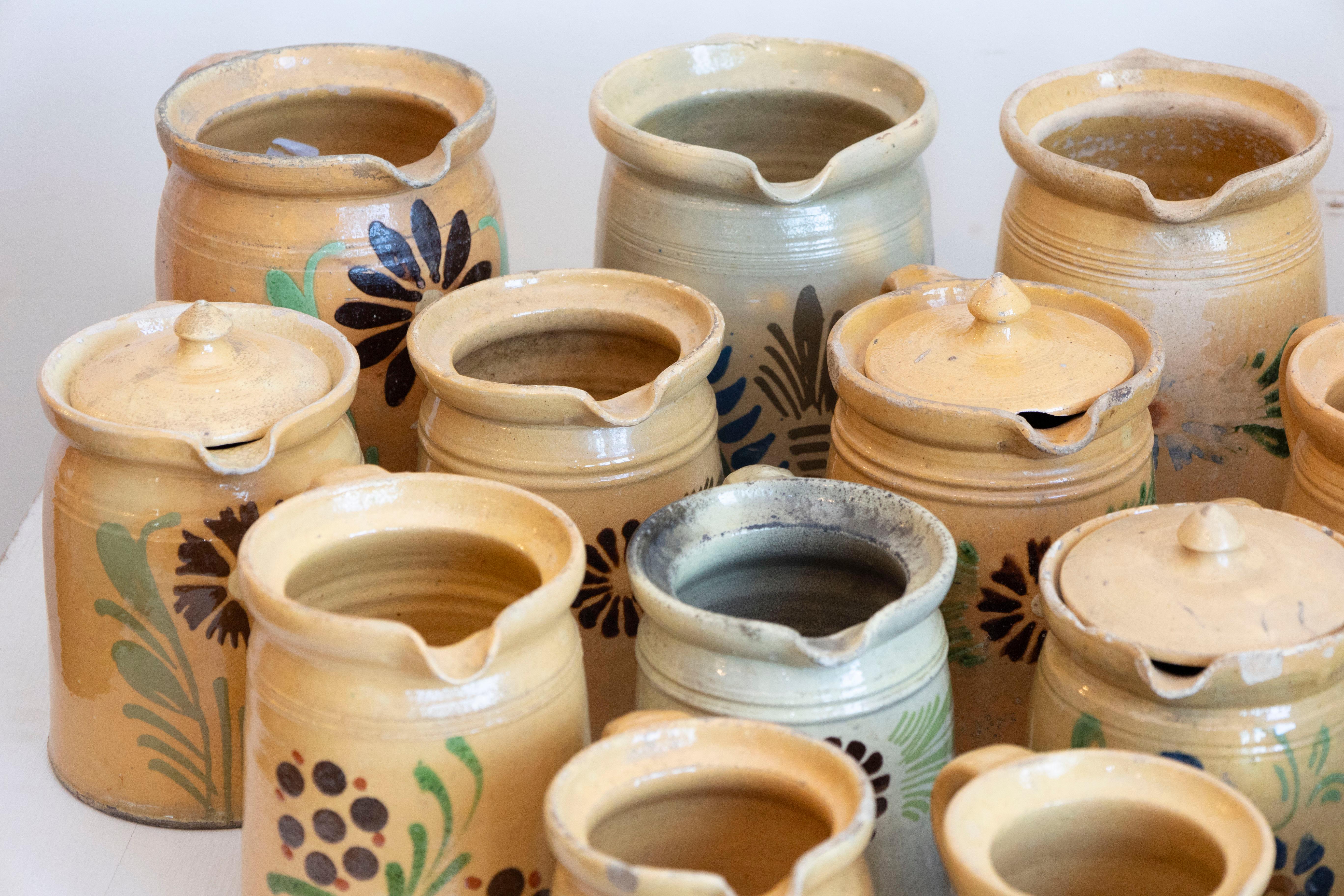 French 19th Century Terracotta Pottery Pitchers with Floral Decor, Sold Each In Good Condition For Sale In Atlanta, GA