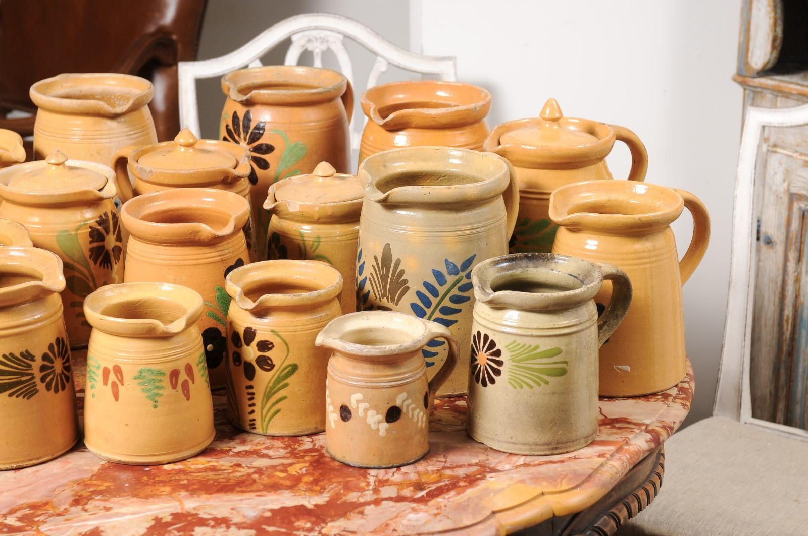 French 19th Century Terracotta Pottery Pitchers with Floral Decor, Sold Each For Sale 1