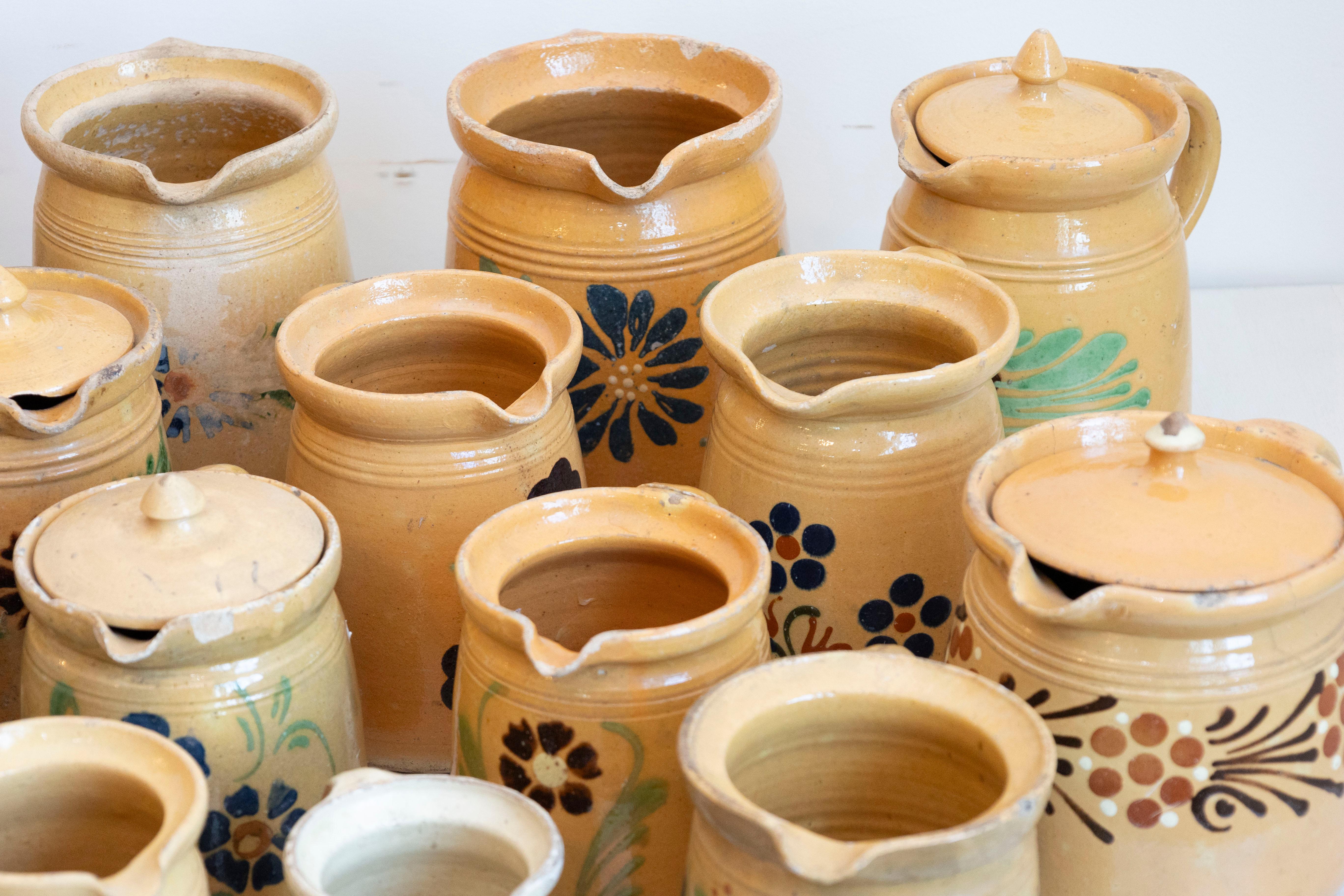 French 19th Century Terracotta Pottery Pitchers with Floral Decor, Sold Each For Sale 1