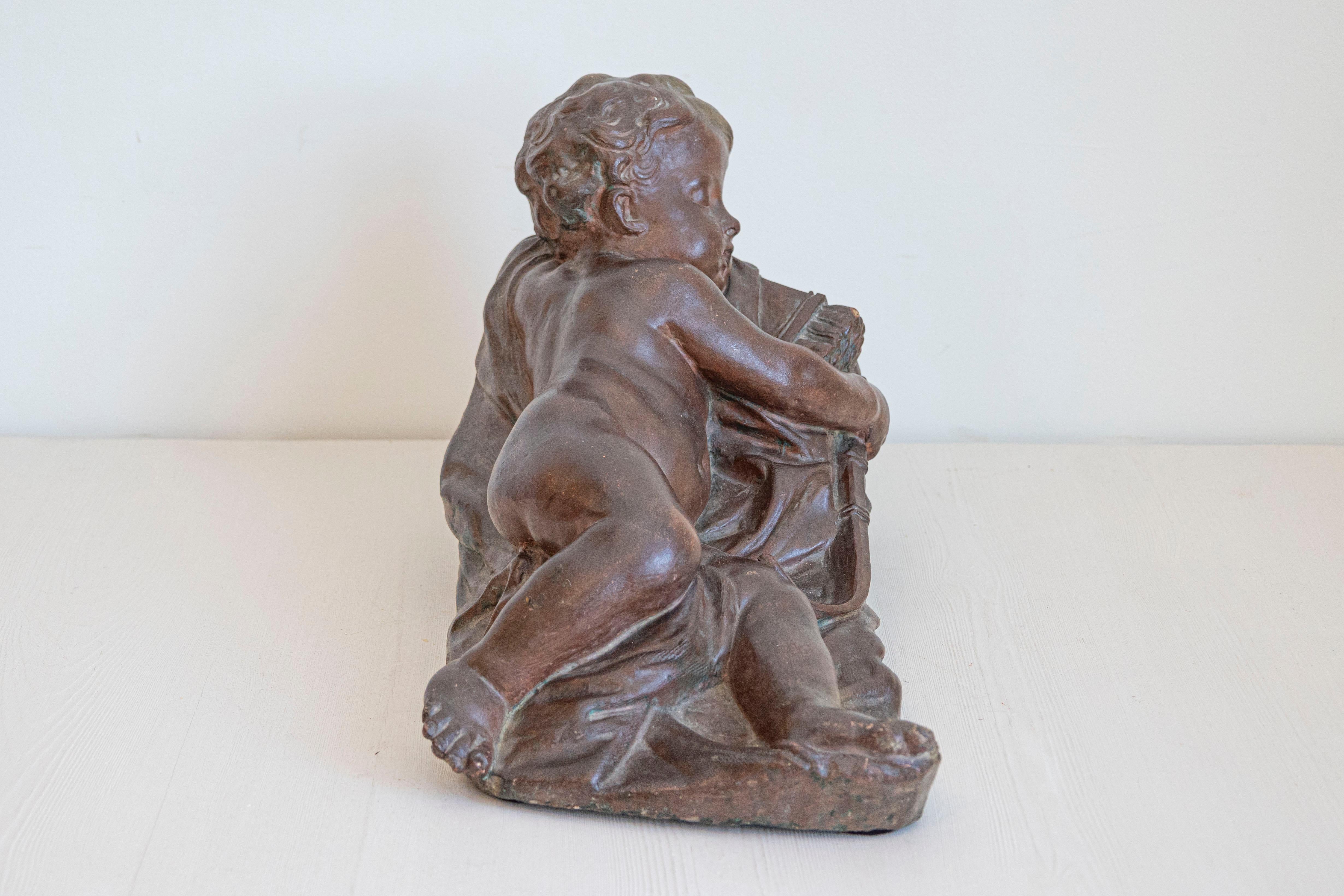 Terracotta Cupido dormiente in terracotta francese del XIX secolo dopo Giovacchino Fortini in vendita