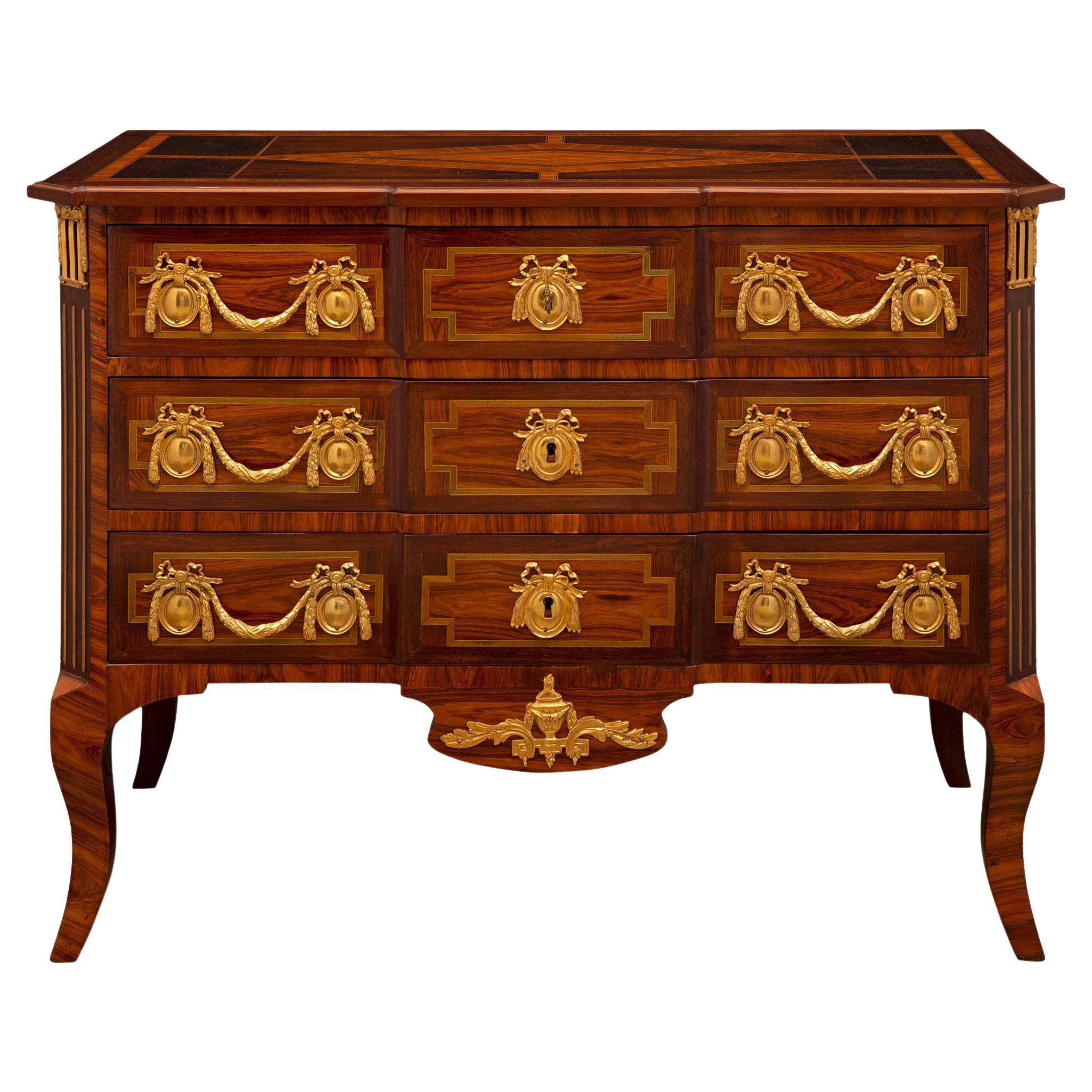 French 19th Century Transitional St. Kingwood, Tulipwood, and Ormolu Commode For Sale