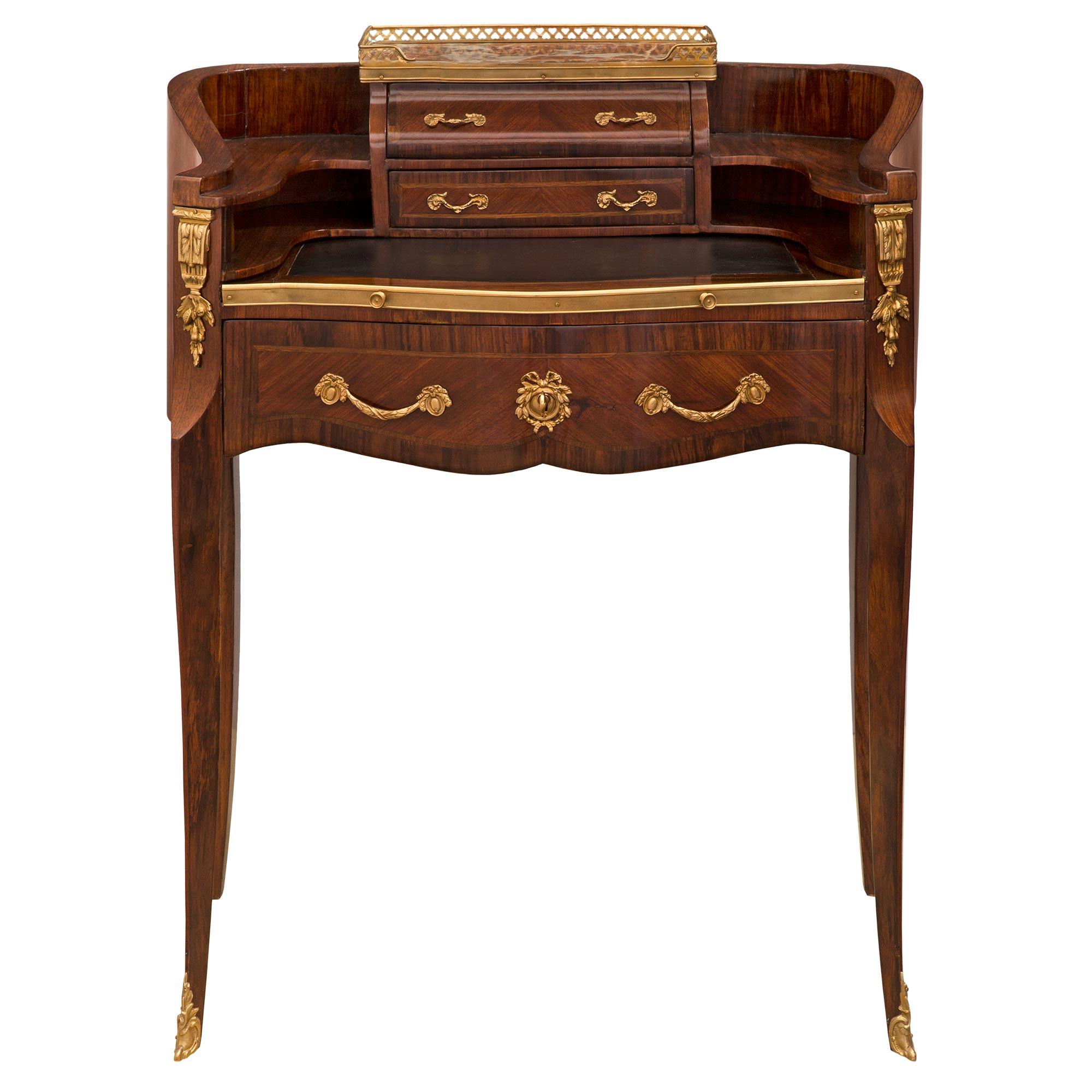 French 19th Century Transitional St. Kingwood, Tulipwood and Ormolu Desk For Sale