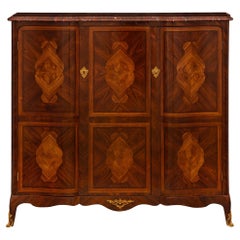 French 19th Century Transitional Style Kingwood, Ormolu, and Marble Cabinet