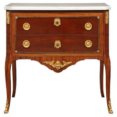 Commode française de style transition du XIXe siècle en acajou et bronze doré