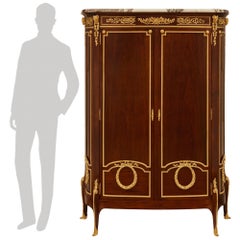 French 19th century Transitional st. Mahogany and Ormolu armoire, signed Linke
