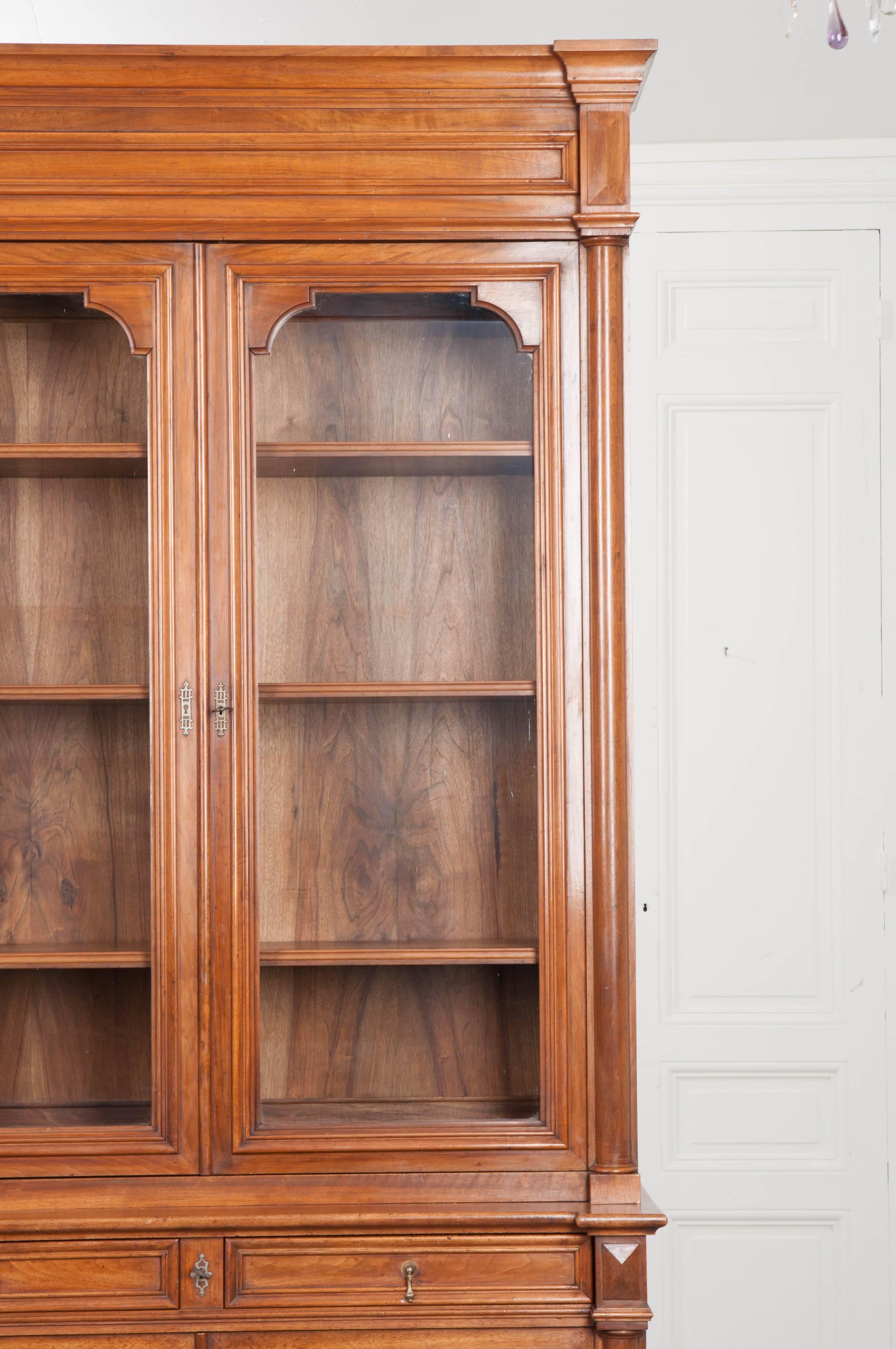 French 19th Century Transitional Walnut Bibliothèque In Excellent Condition In Baton Rouge, LA