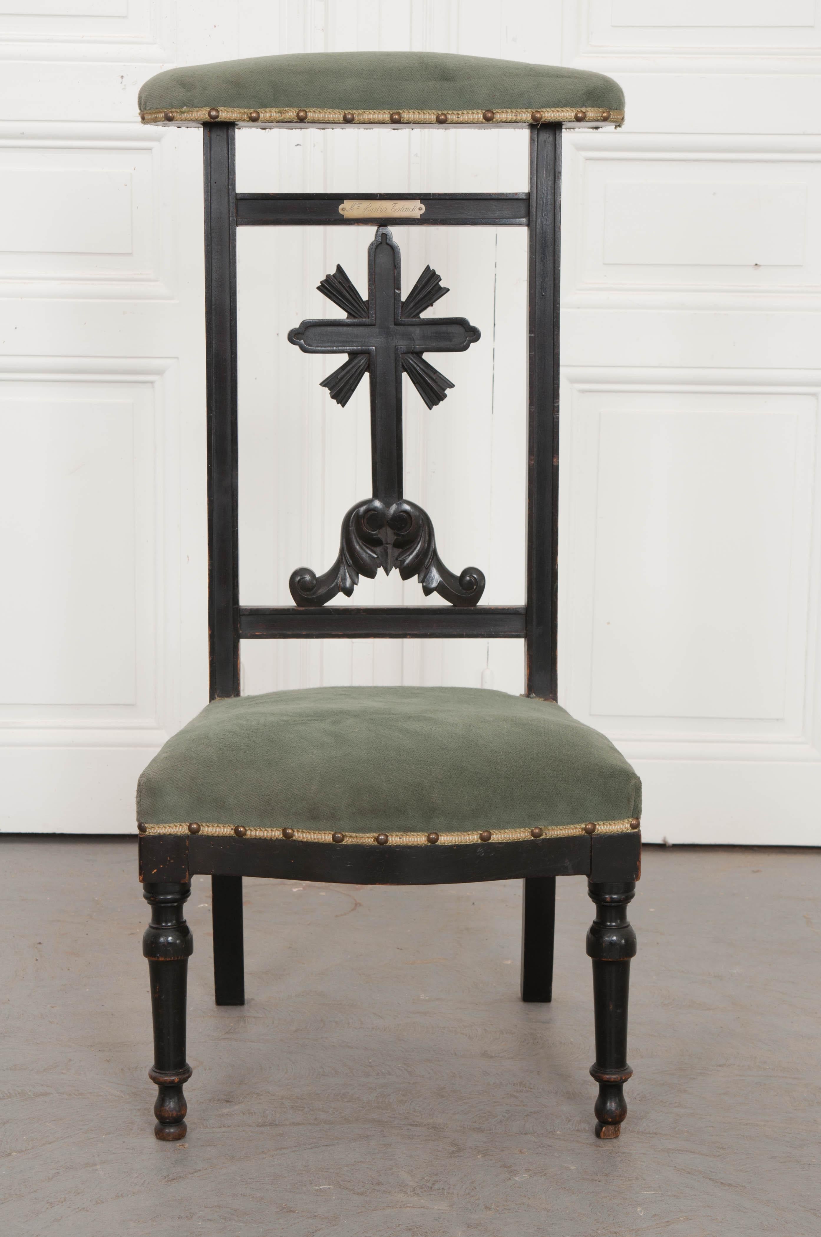 A delightful 19th century prie deux, upholstered in a cadet blue-green velvet fabric. The frame is made of hardwood that has been ebonized. This exceptional finish has become patinated over the decades, exposing some of the hardwood beneath. Below
