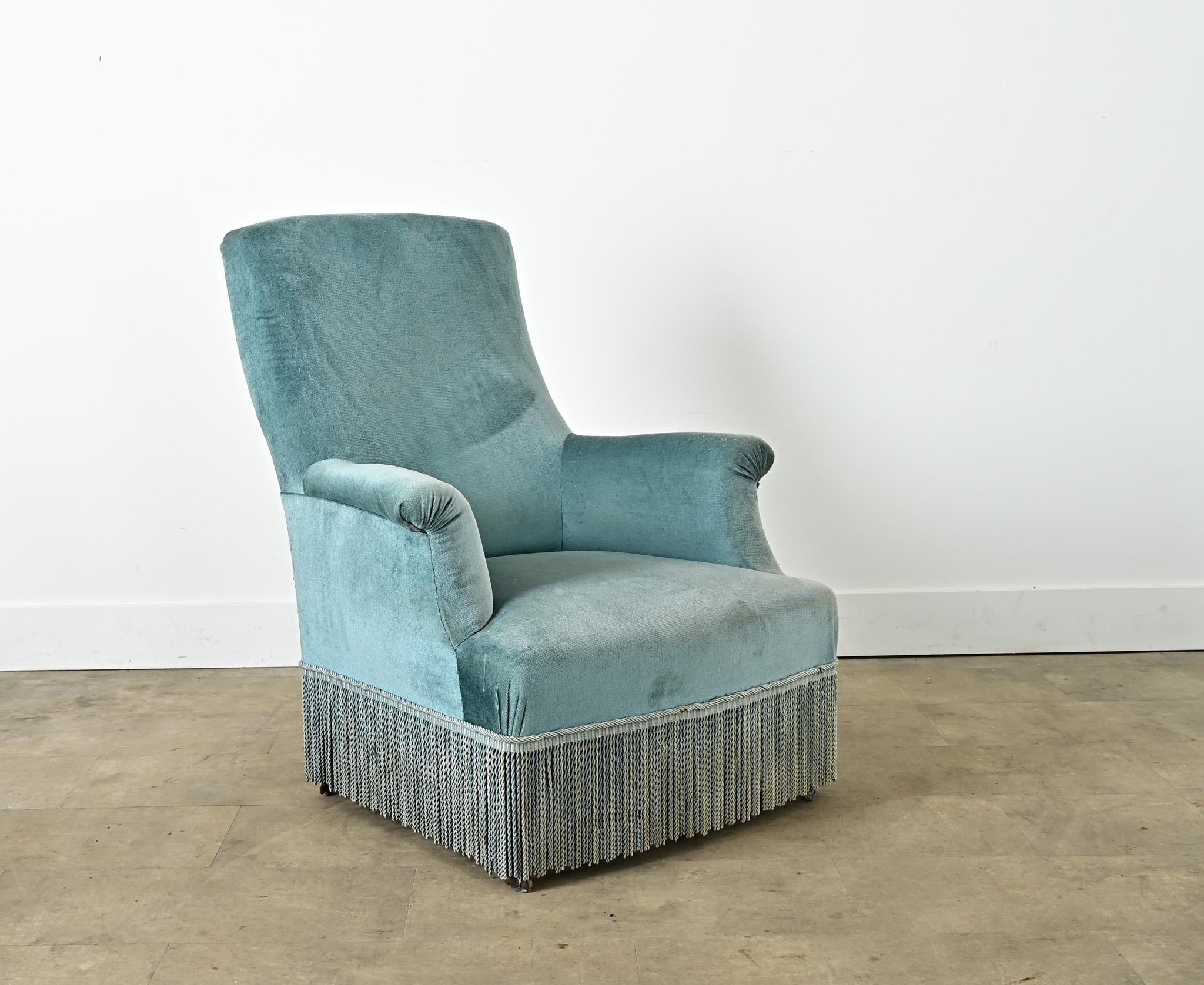 
A 19th century French Napoleon III style armchair with a tall back at a slight recline in an angular profile that is at once restrained and welcoming. This example is upholstered in a regal shade of sky blue (in the Louis XVI and Gustavian tastes)