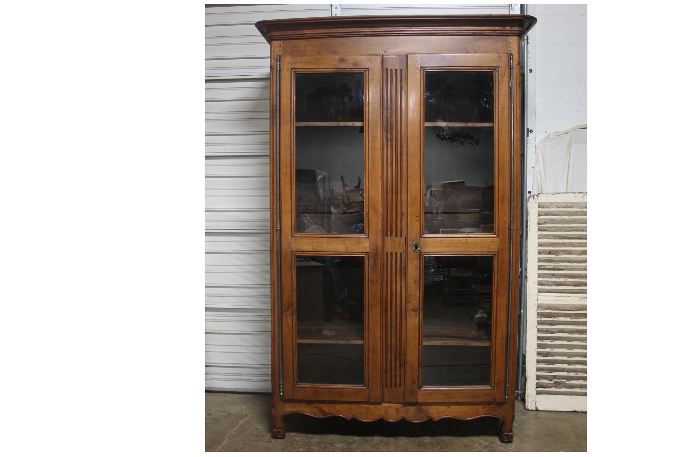 This vitrine is tall and narrow with a beautiful patine. Wonderful to put smalls or books in it. The inside dimensions are 52'' W x 16'' D.