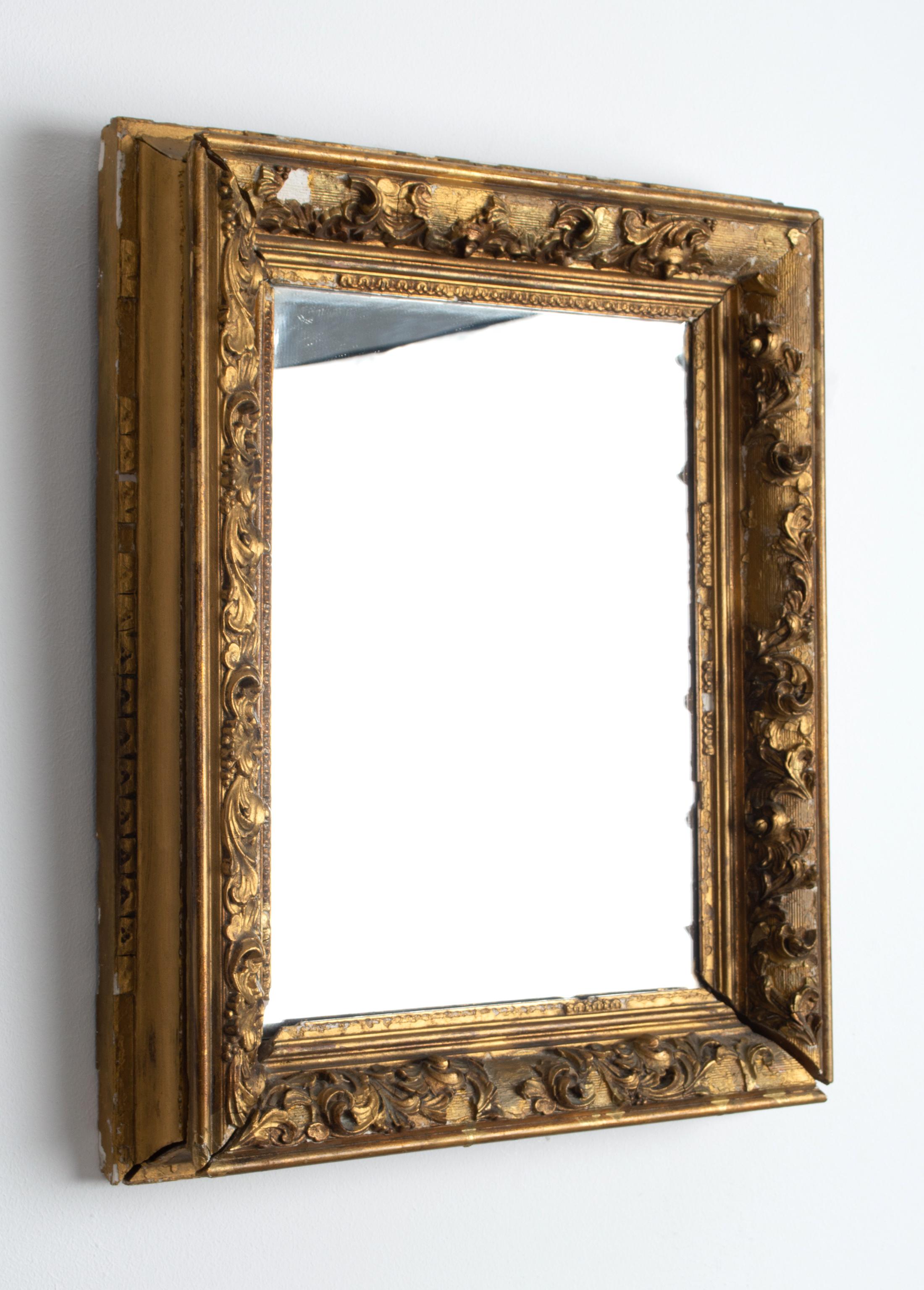 French 19th Century Wall Mirror Gesso Distressed frame
Originally a picture frame, now housing a mirror. Mirror could be removed to frame a painting once again.

Heavy distressing and losses to the gilt frame. Please refer to photos.