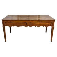 French 19th Century Walnut Desk with Carved Apron and Lateral Drawer