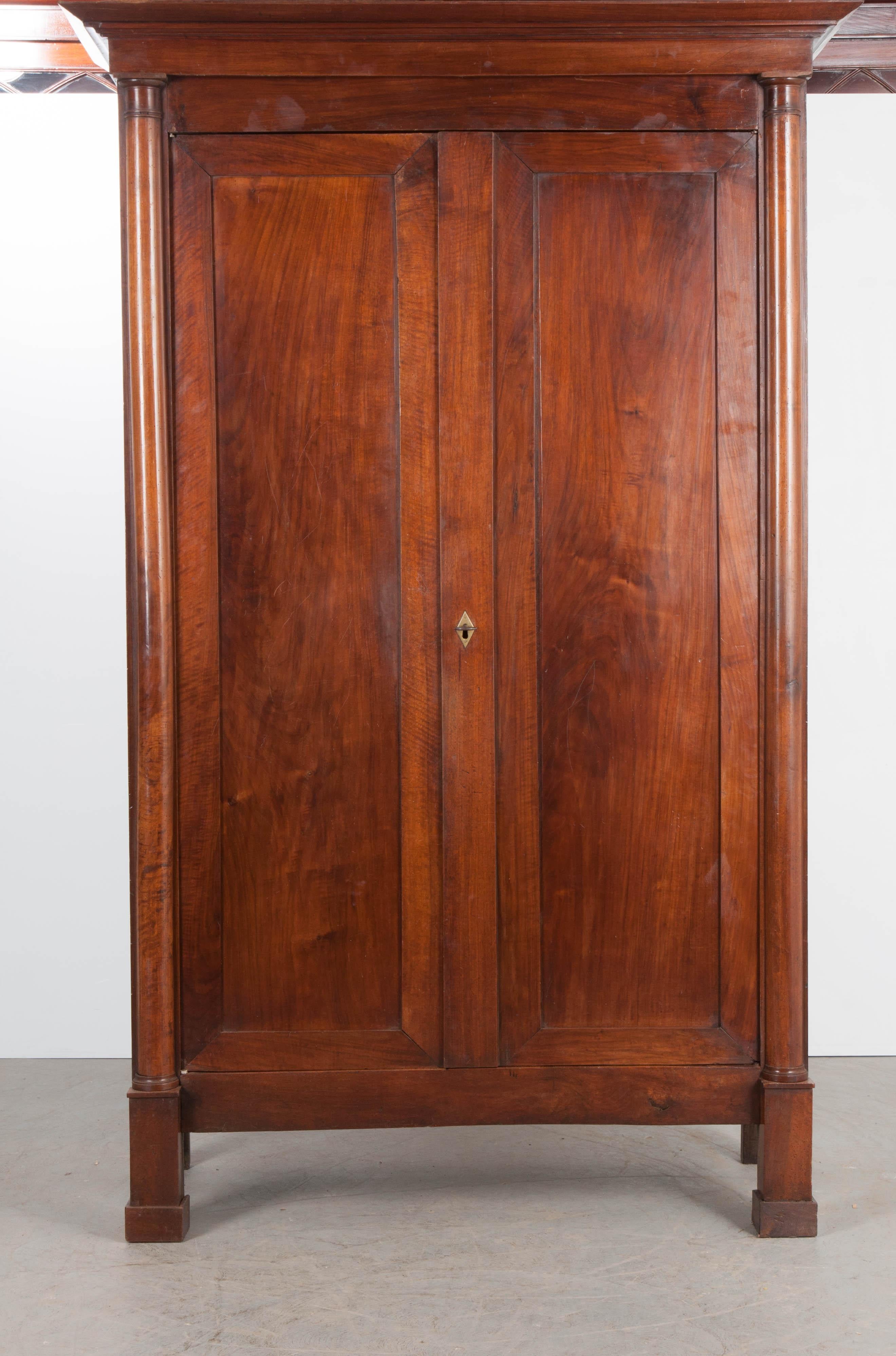 Patinated French 19th Century Walnut Empire Armoire