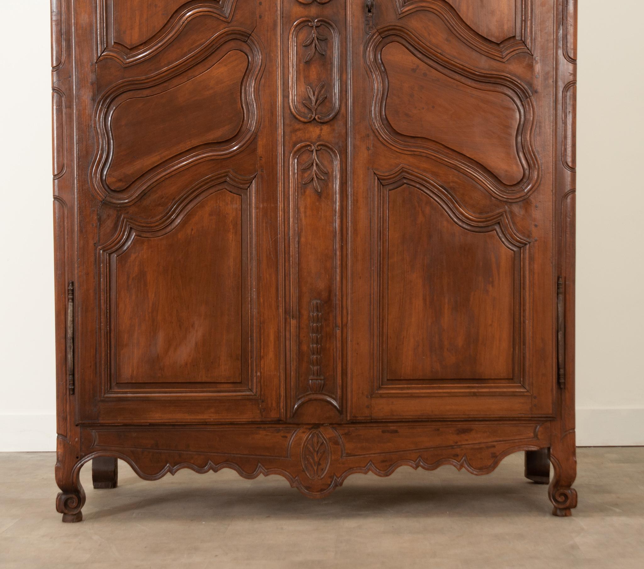 Hand-Crafted French 19th Century Walnut Louis XV Style Armoire For Sale