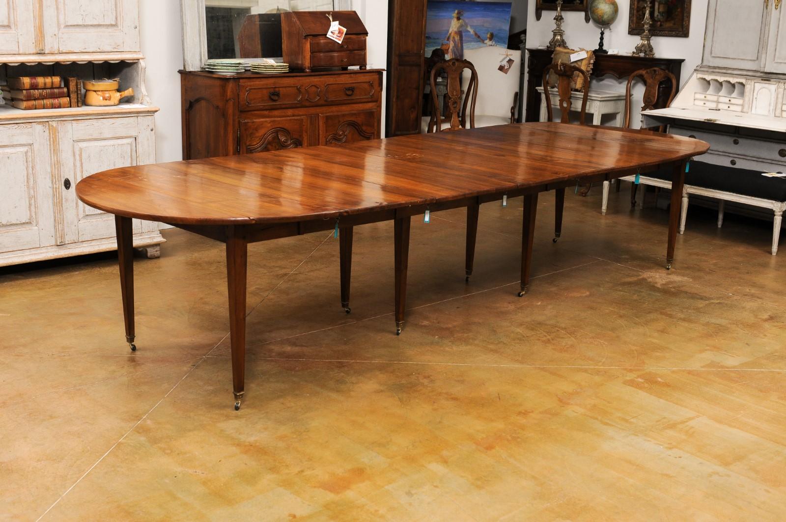 French 19th Century Walnut Oval Extension Dining Table with Five Leaves 7