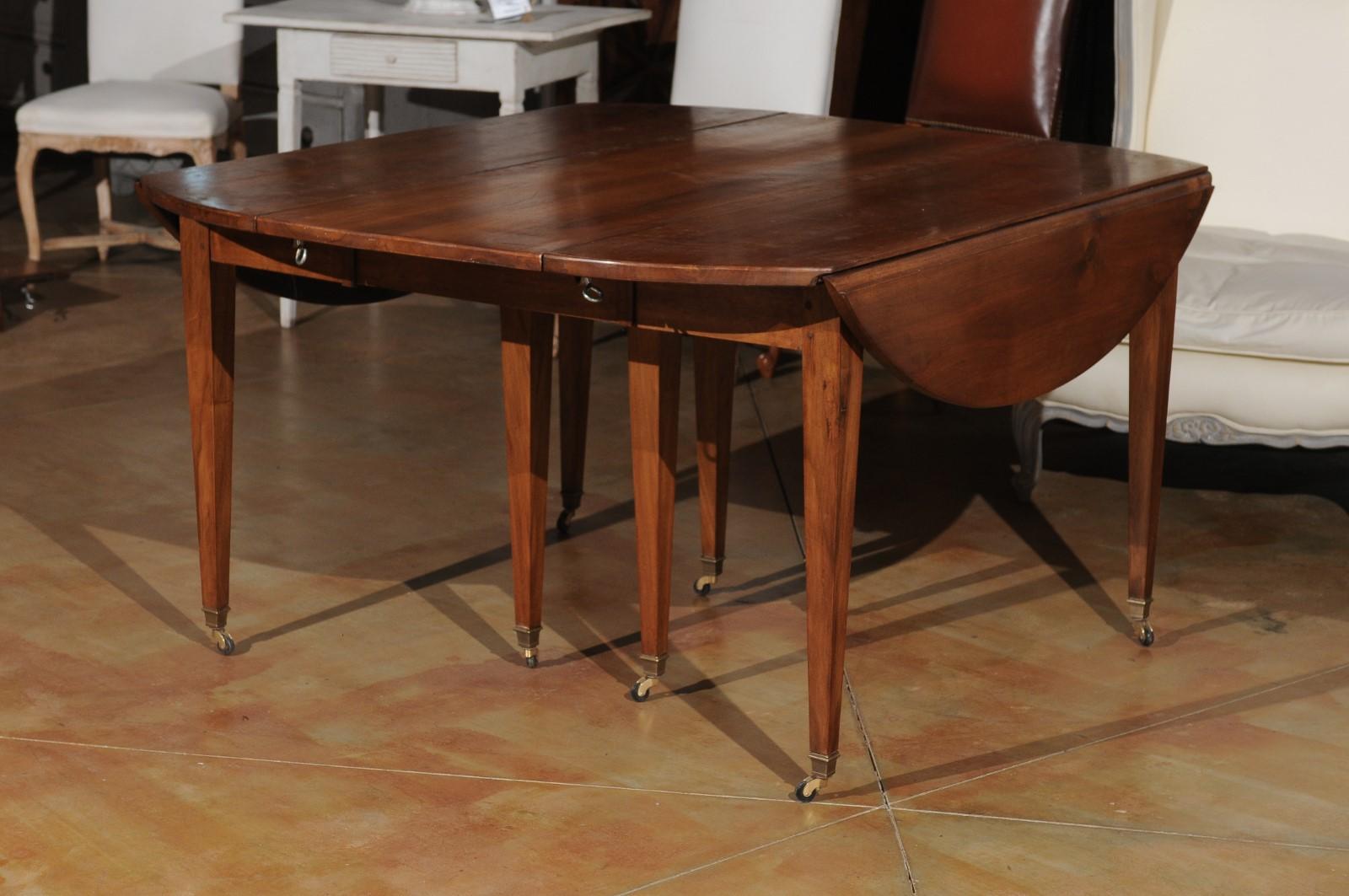 ON HOLD French 19th Century Walnut Oval Extension Dining Table with Five Leaves 8