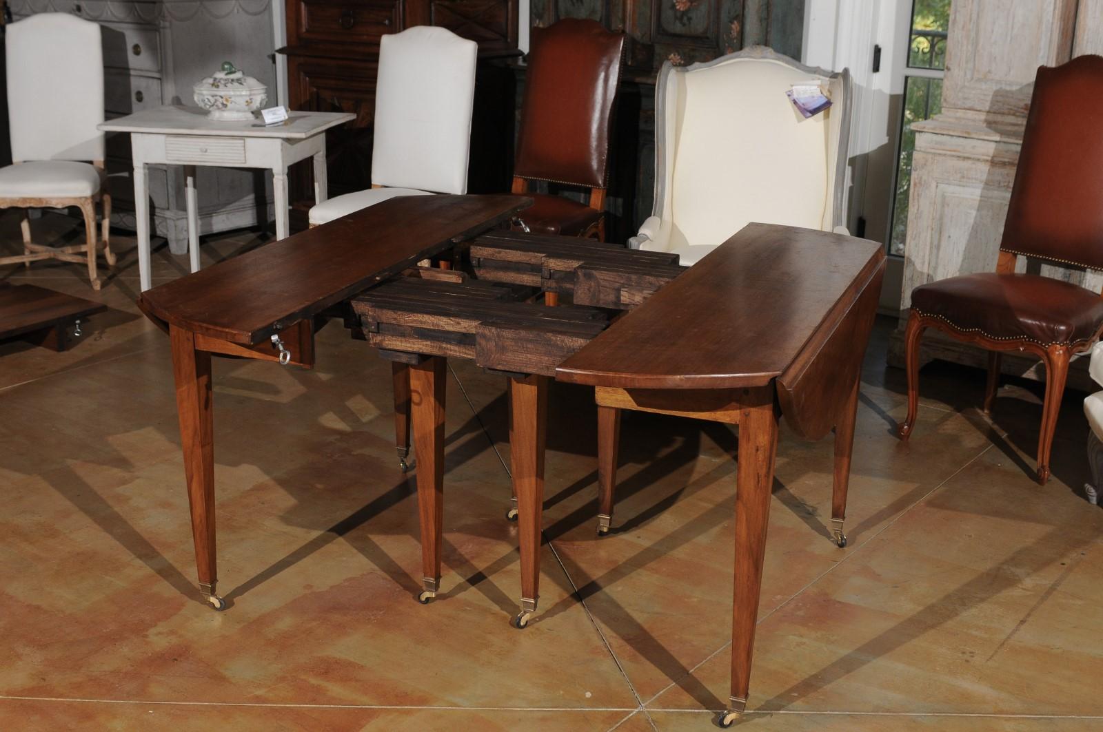 ON HOLD French 19th Century Walnut Oval Extension Dining Table with Five Leaves 9