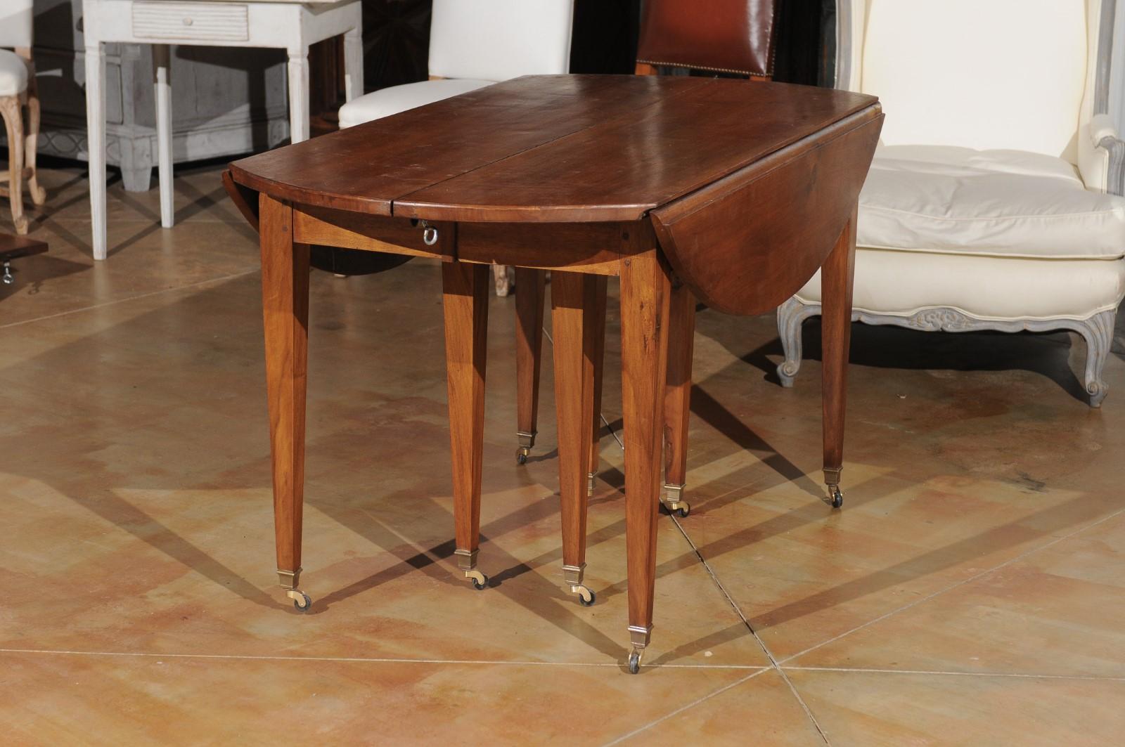 ON HOLD French 19th Century Walnut Oval Extension Dining Table with Five Leaves 10