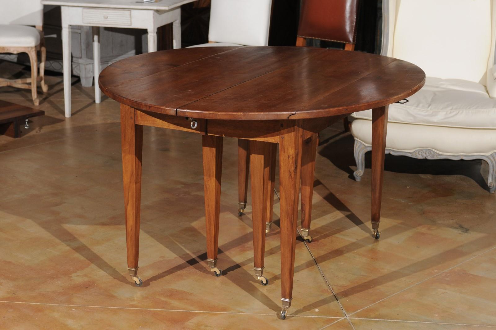 ON HOLD French 19th Century Walnut Oval Extension Dining Table with Five Leaves 11