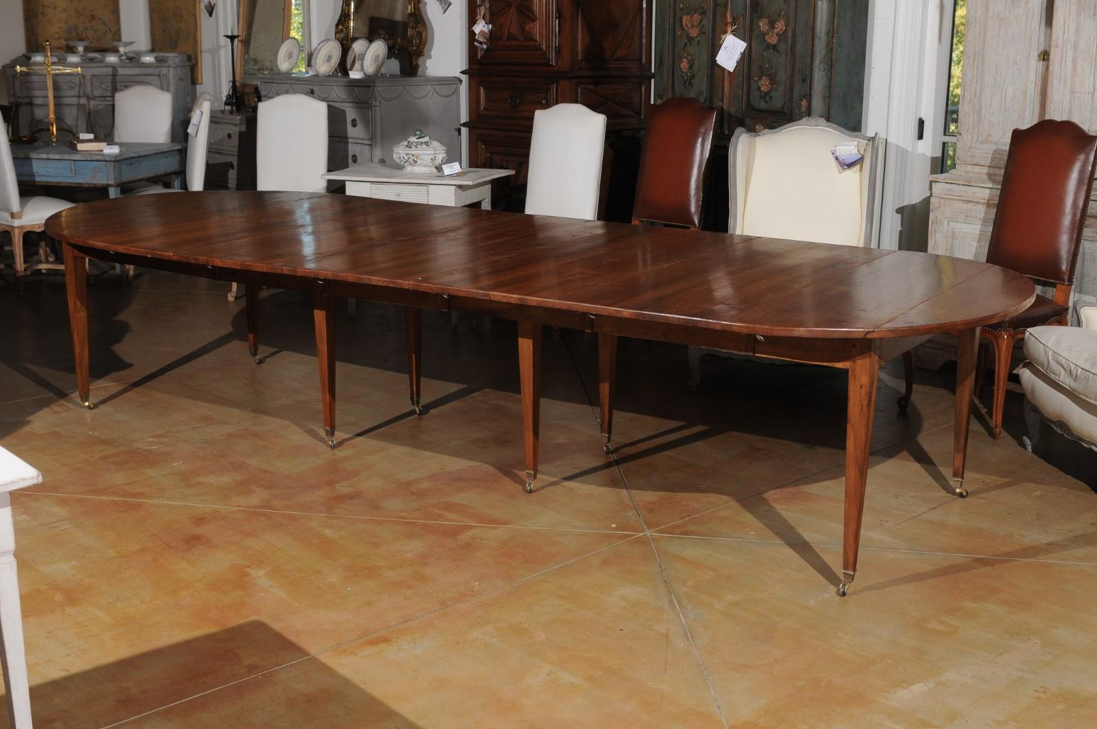 ON HOLD French 19th Century Walnut Oval Extension Dining Table with Five Leaves In Good Condition In Atlanta, GA