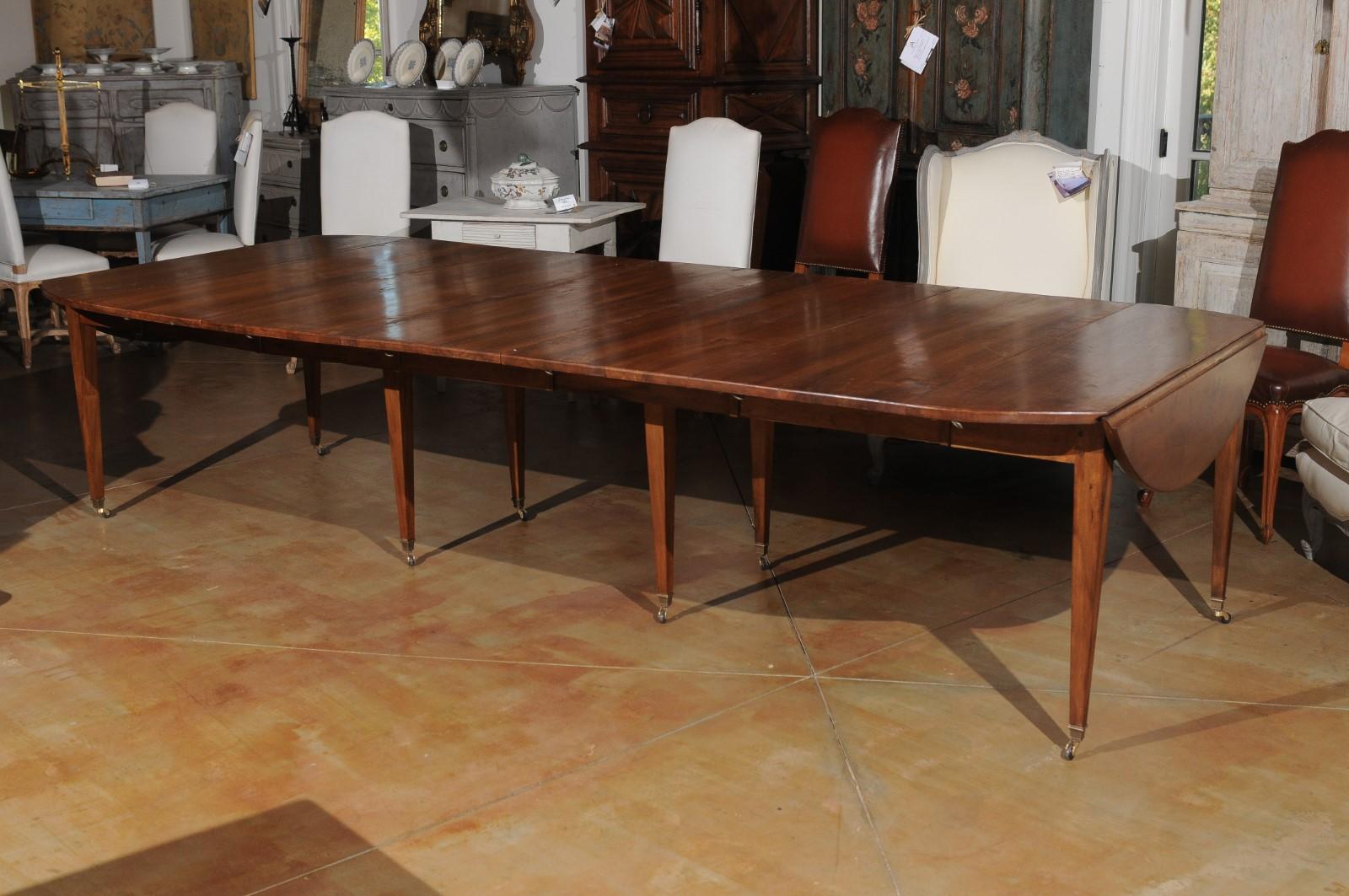 ON HOLD French 19th Century Walnut Oval Extension Dining Table with Five Leaves 4