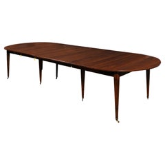 French 19th Century Walnut Oval Extension Dining Table with Five Leaves