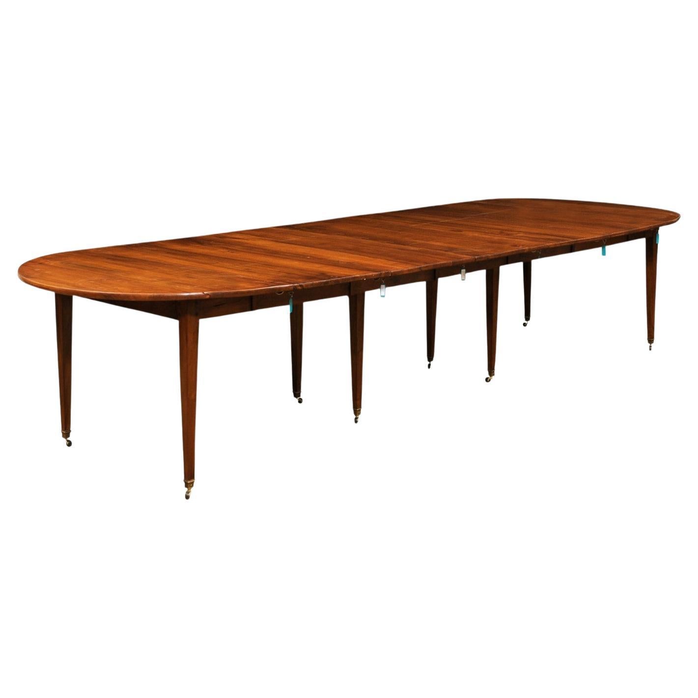 French 19th Century Walnut Oval Extension Dining Table with Five Leaves