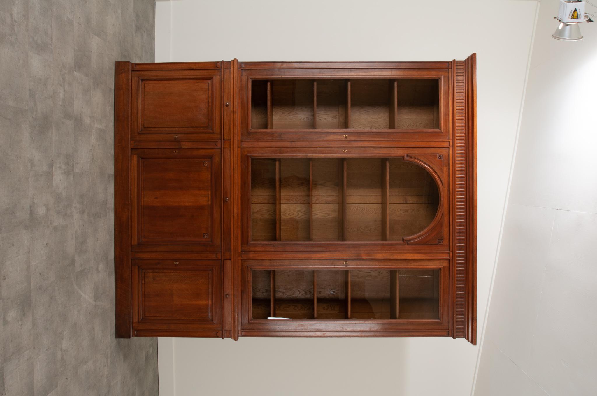 Hand-Carved French 19th Century Walnut Three Door Bibliotheque