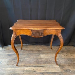 French 19th Century Walnut Writing Table or Desk with Lions and Shield Crest