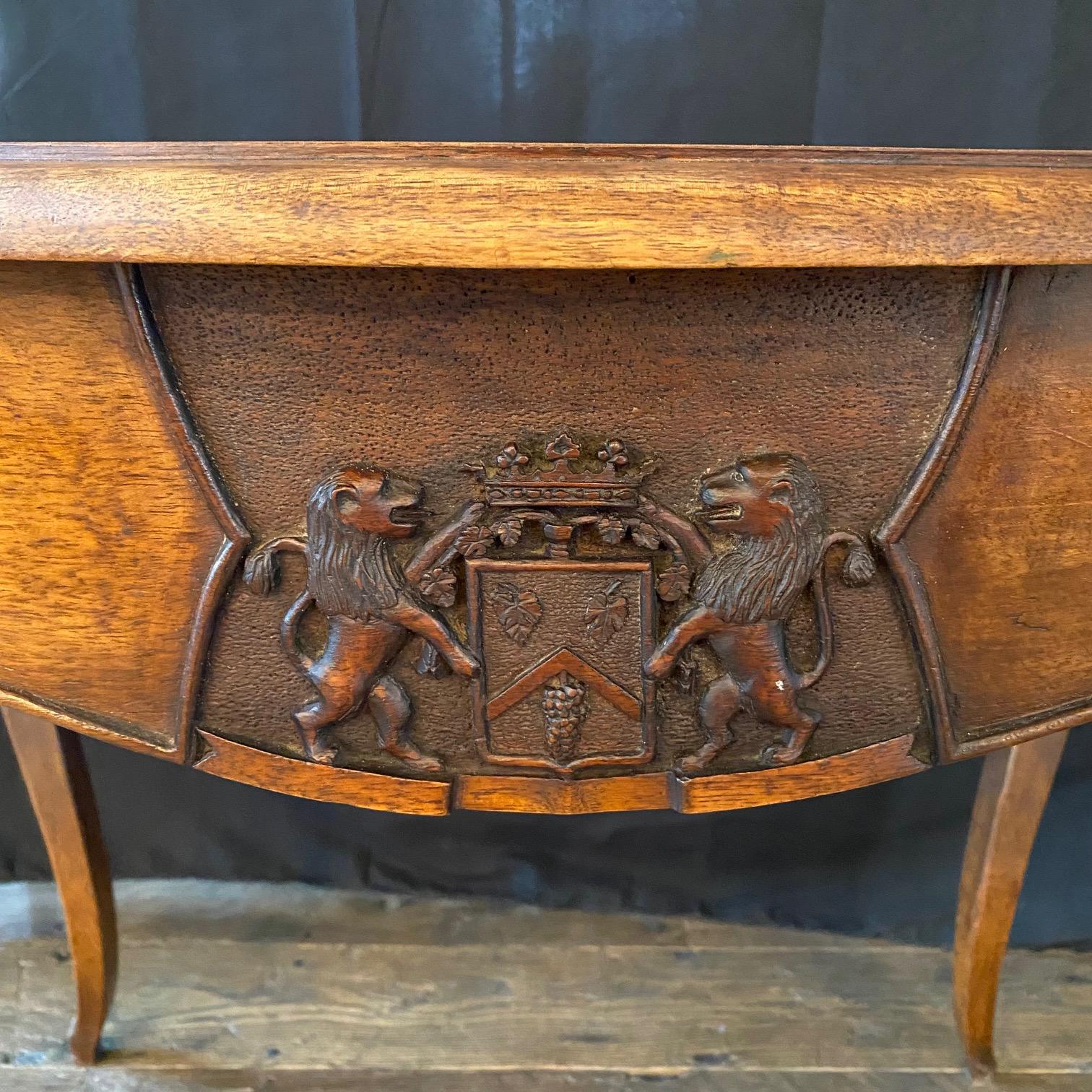 French 19th Century Walnut Writing Table or Desk with Lions and Shield Crest In Good Condition For Sale In Hopewell, NJ