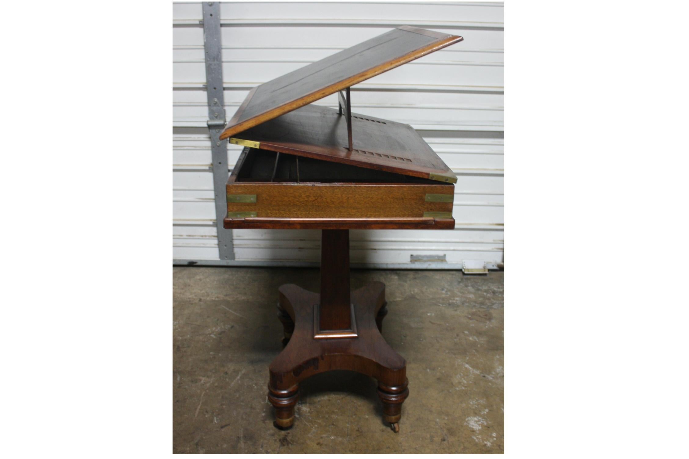 This is an 19th century watercolorist table. Very rare piece in a good condition. It has 2 levels, 1 is to put the colors and the other one is to rise up the leather board.
When the system is opened, the hight is 41''H
Just beautiful!.