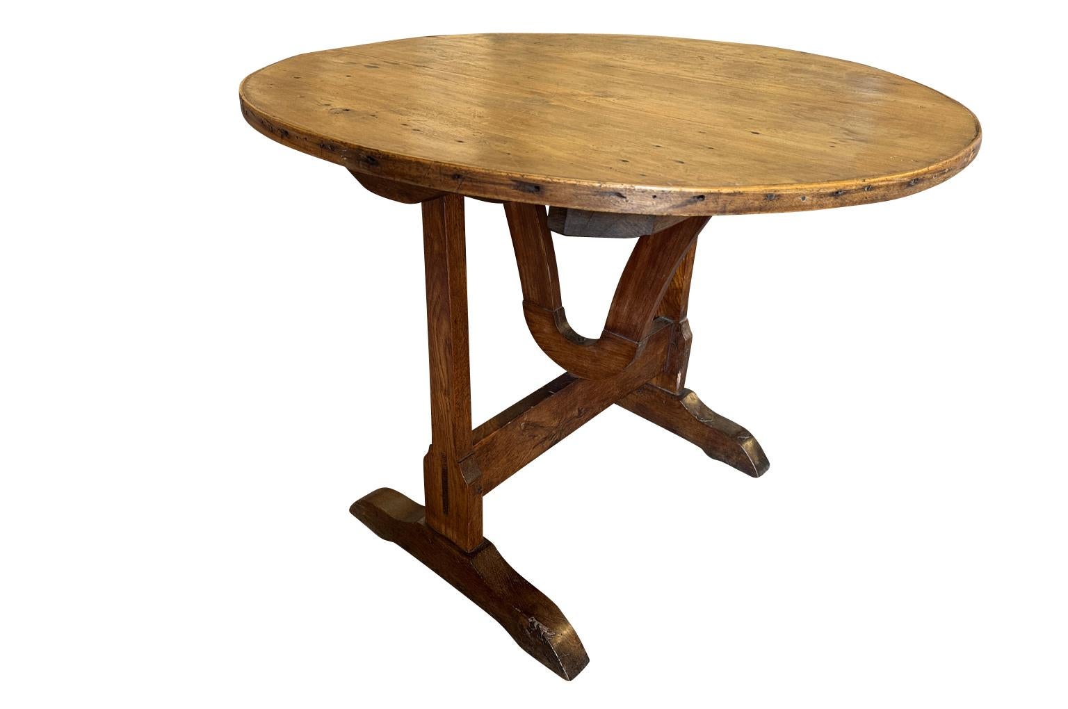 A very charming mid-19th century Wine Tasting Table - Table Vigneron from the Provence region of France.  Beautifully constructed from handsome chestnut and poplar with a tilting top.  Wonderful patina.