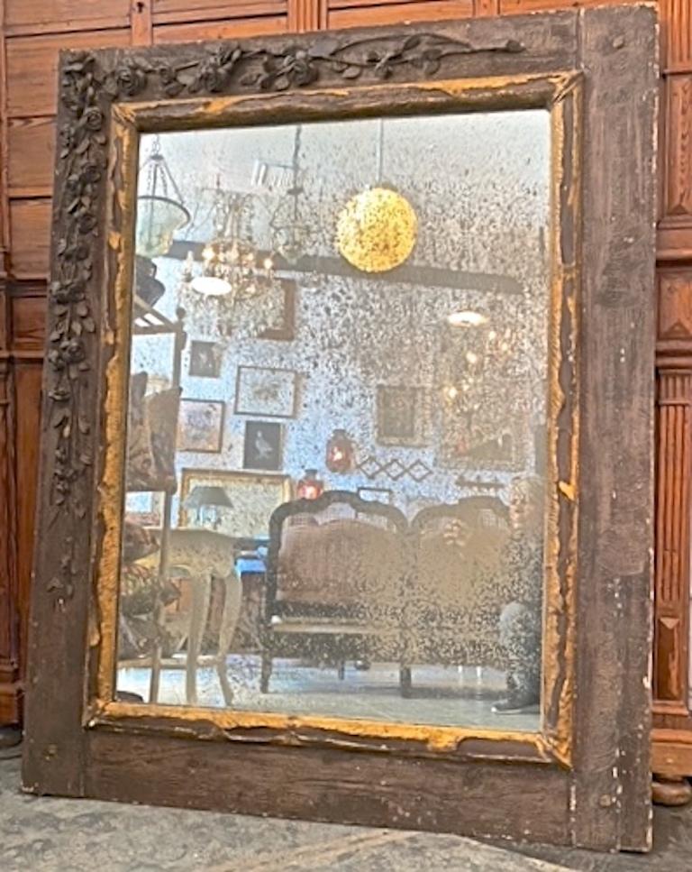 French 19th Century Wood Framed Mirror With Original Glass and Carved Rose Swag In Distressed Condition For Sale In Santa Monica, CA