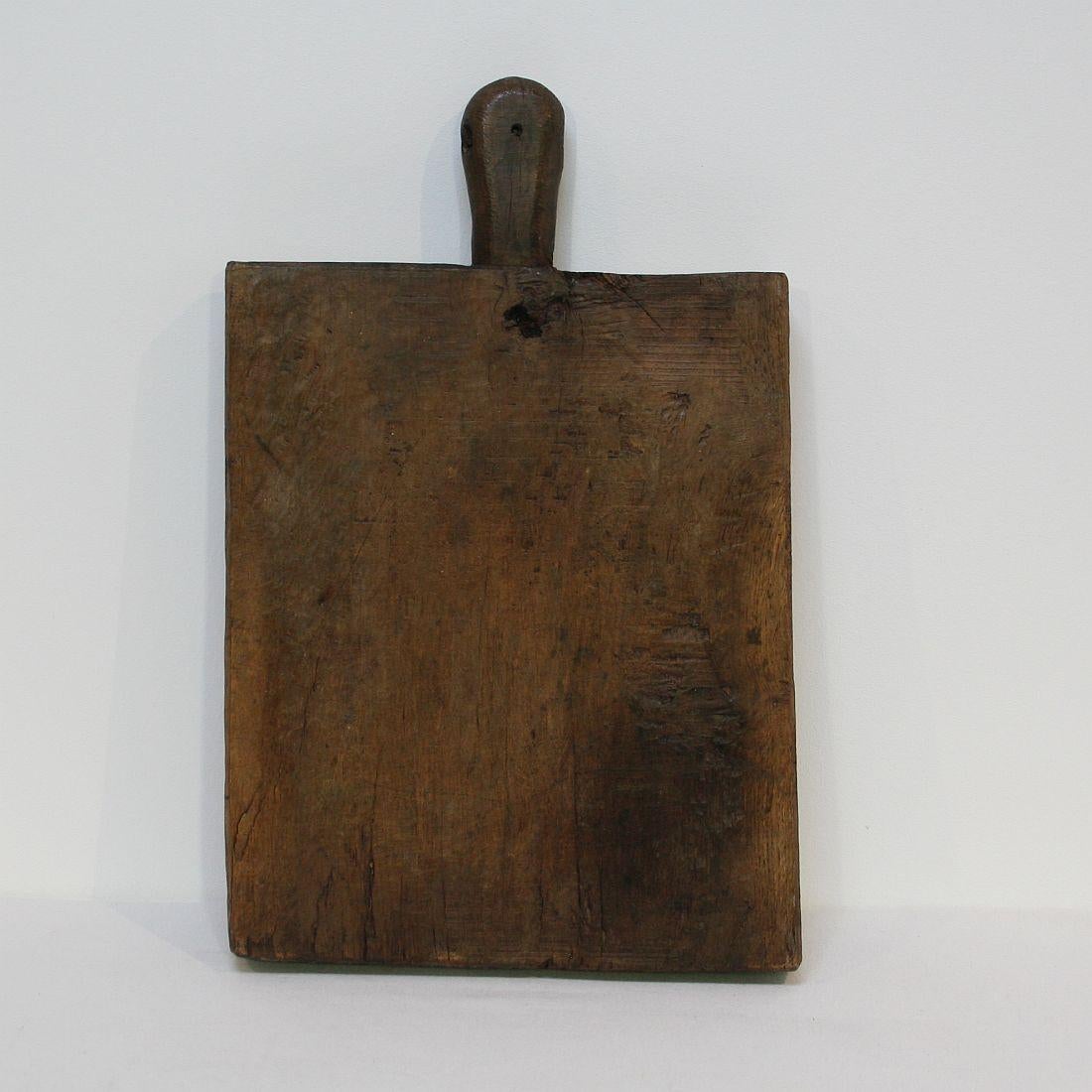 Beautiful and very thick wooden chopping-cutting board. Great statement on your countertop. France circa 1850-1900. Weathered, small losses.