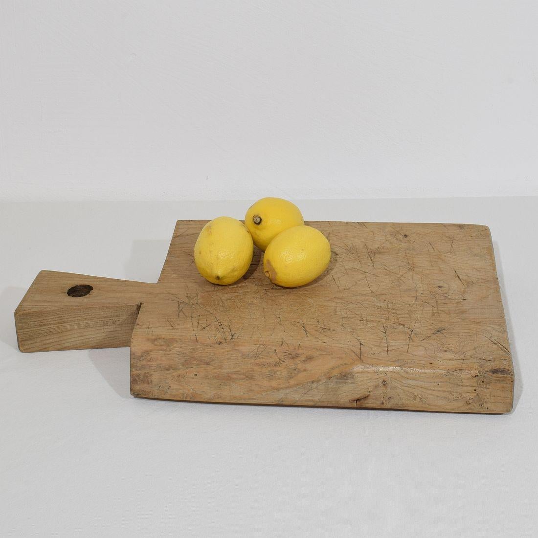 Unique wooden chopping-cutting board with a beautiful form. Great statement on your countertop,
France, circa 1850-1900
Weathered. If needed items were treated against woodworm.