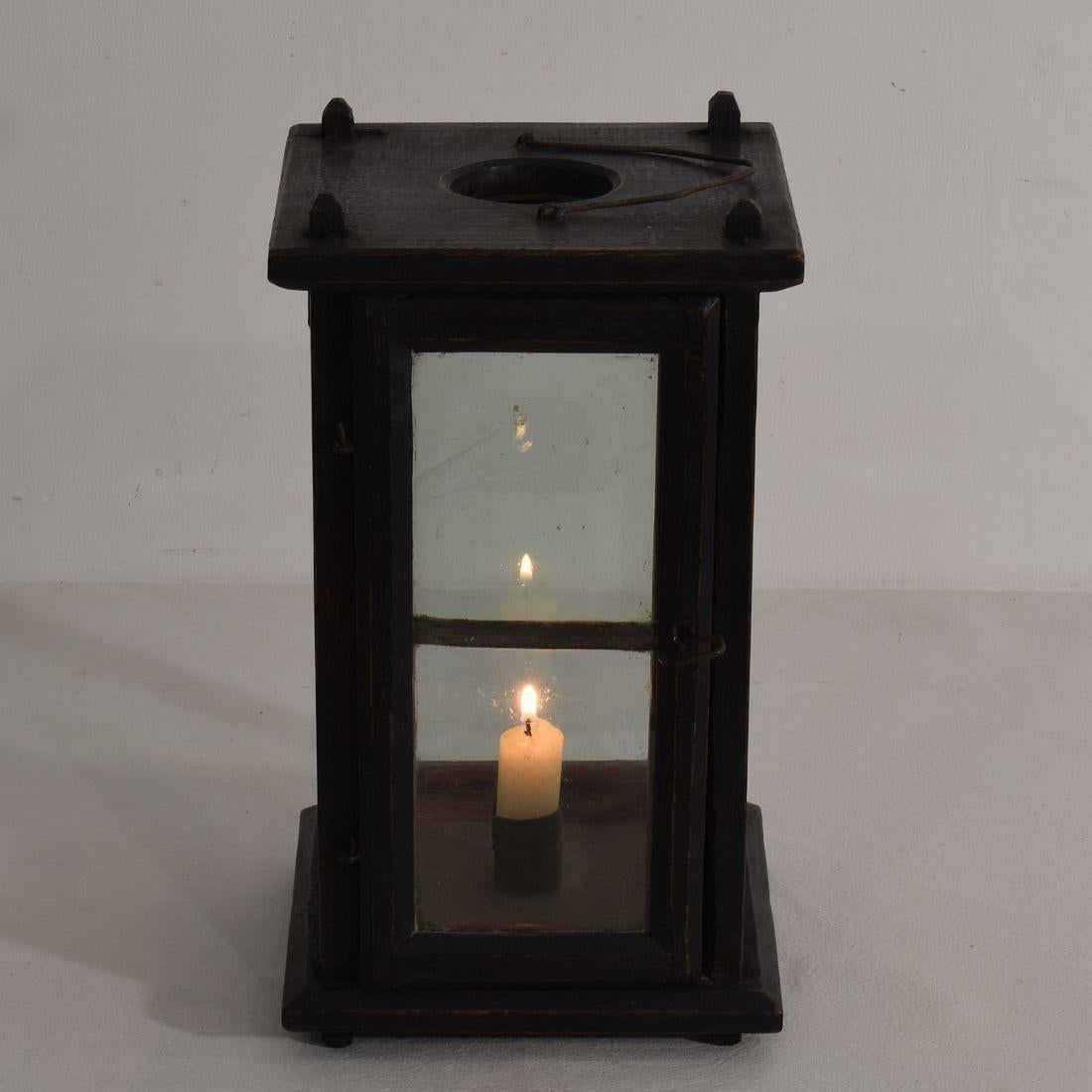 Beautiful and rare wooden lantern with nice old glass, France, 19th century. Weathered and antique repair.



 