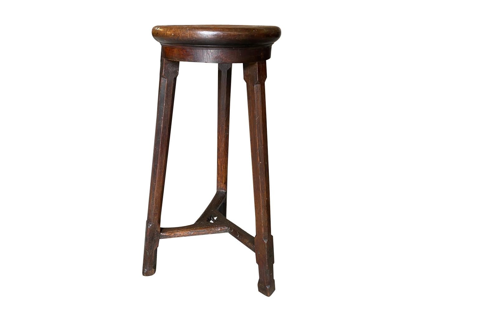 A very charming 19th century Work Stool from the Provence region in France. Sturdily constructed from walnut & chestnut with three legs and a handsome rounded edge finish to the seat. Great patina. The seat diameter is 12 1/2