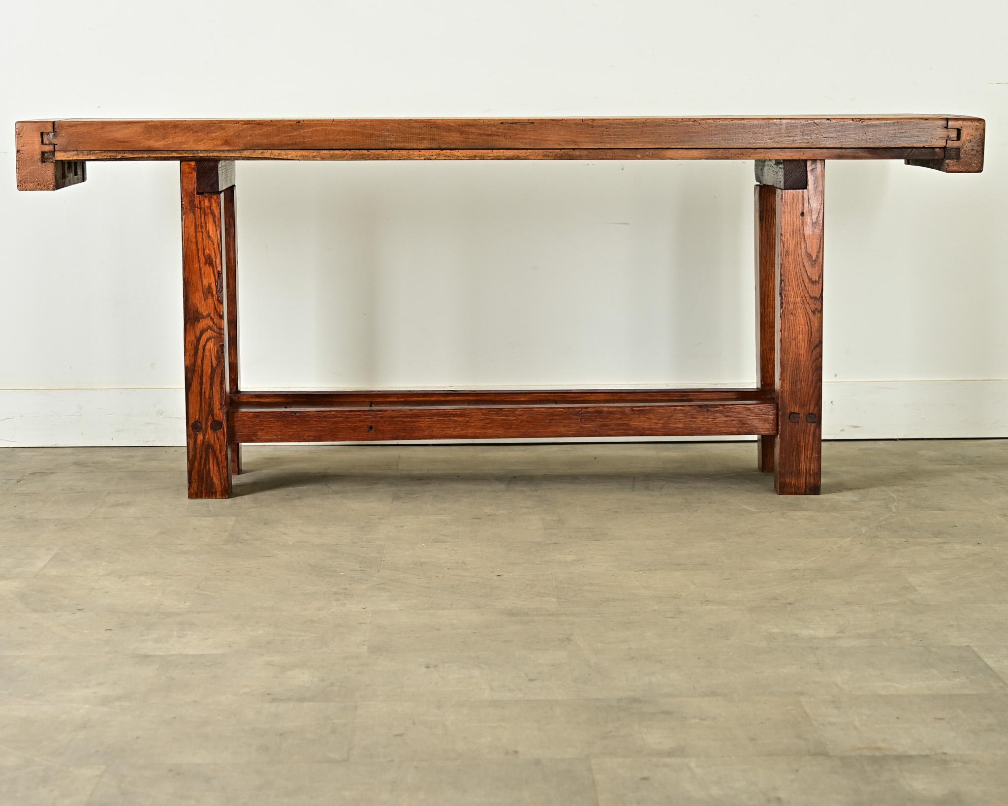 This French 19th century workbench is a fascinating relic of technology from before the assembly line, a hybrid of artisanal rusticity and industrial innovations specially adapted for the artisan who made it. The top planks are impossibly thick,