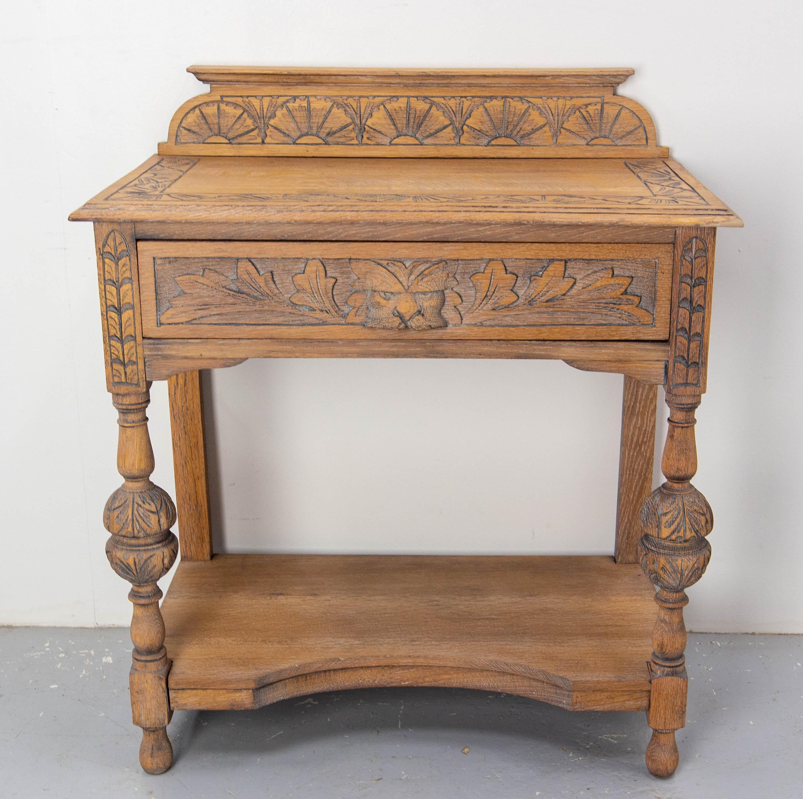 Writing table or desk Henri II (also named Louis XIII style) 19th century with lion masque drawer handle
Table height: 27.56 in. (70 cm)
Hand carved oak
Refinishing by our cabinet maker with oil and white pigment which highlights the pores of the