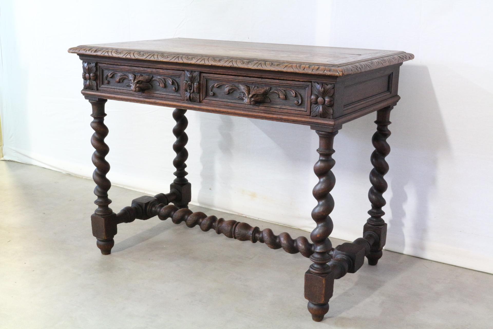 Writing table or desk Henri II 19th century with lion masque drawer handles
Barley twist legs and cross bar
Carved edge top
Hand carved oak
Good antique condition with very good patina minor signs of use for its age
Charming.
