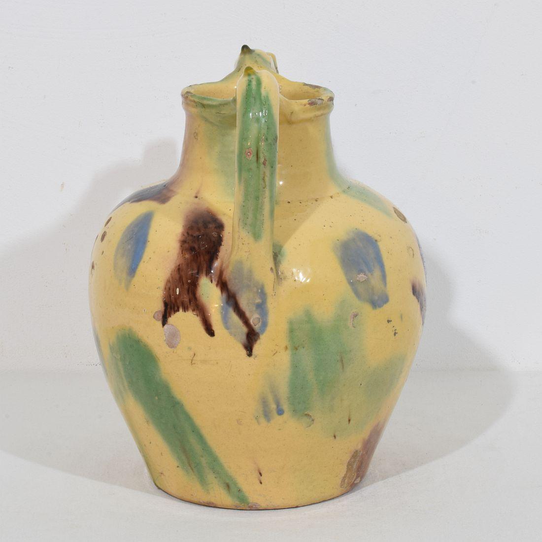 Terre cuite Cruche en terre cuite émaillée jaune du 19e siècle ou cruche à eau 