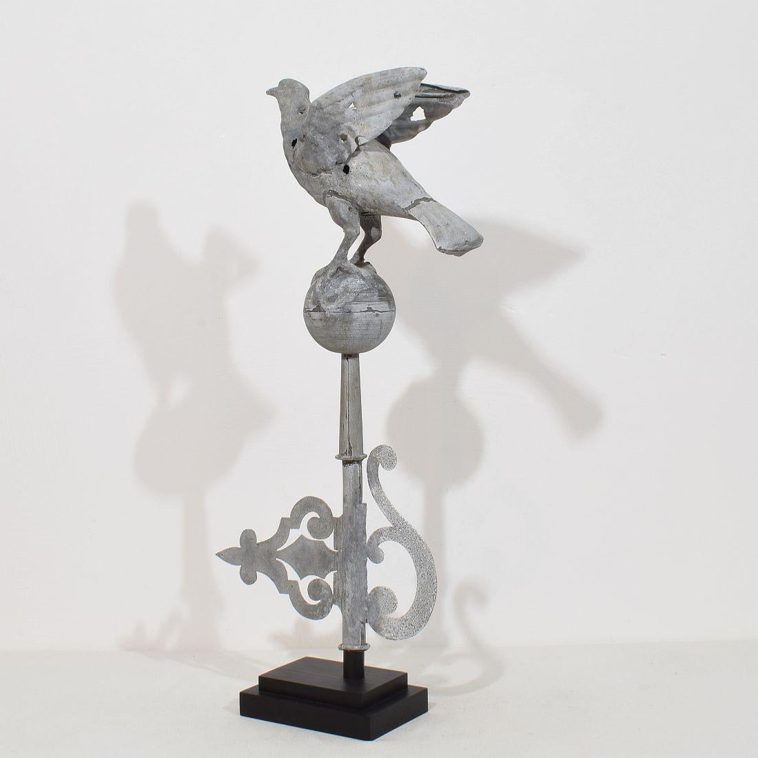 Beautiful and very rare zinc roof ornament with a dove.
France, circa 1850-1900. Weathered, minor losses and small old repairs.
H:71cm  W:33cm D:12cm 